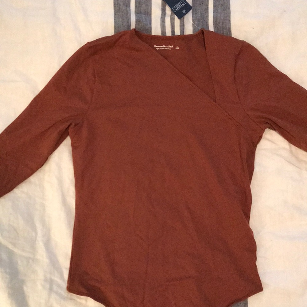 New with tags, never worn, body suit